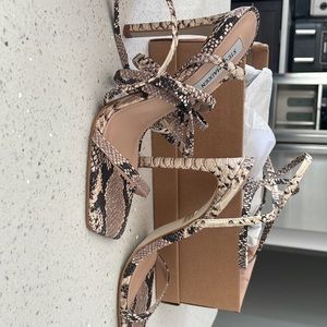 Snakeskin uplift heels
